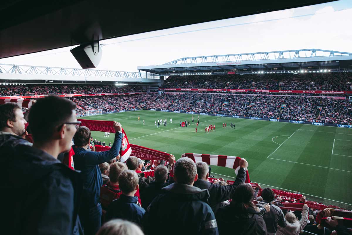 Read more about the article Fans raising the banner high after Liverpool wins 2-0 against Totten ham FC